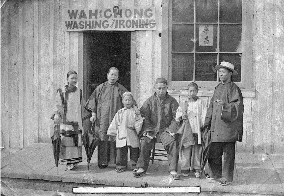 Family in front of Wah Chong Washing and Ironing, 1895. Image: City of Vancouver Archives/AM1376-:CVA 178-2.8.