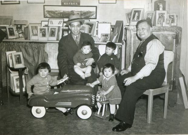 Photo taken in Yucho Chow Studios at 518 Main Street, circa 1940. Yucho Chow (right) with his grandchildren. Yucho Chow - courtesty of Leonard A Chow/Dr Leonard Chow & The Globe and Mail