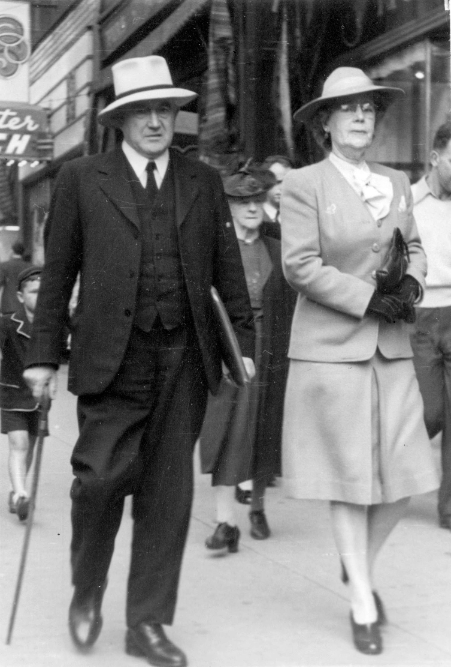 First City Archivist Major Matthews (1878–1970) with wife Emily at Granville & Robson. He came to Vancouver in 1898 and began collecting and documenting the City’s history, finally acknowledged with his appointment as archivist in 1933. Photo by Kandid Kamera Snaps, 1940s. AM54-S11-3---: CVA 371-3076