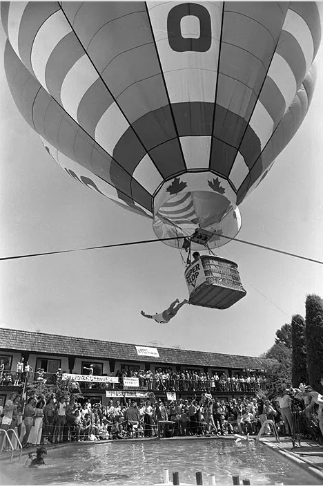 Who needs a diving board when you have a hot air balloon. The World Belly Flop and Cannonball Diving Championship at the Coach House Inn in North Vancouver. Photo courtesy John Denniston, 1979 Image: www.evelazarus.com