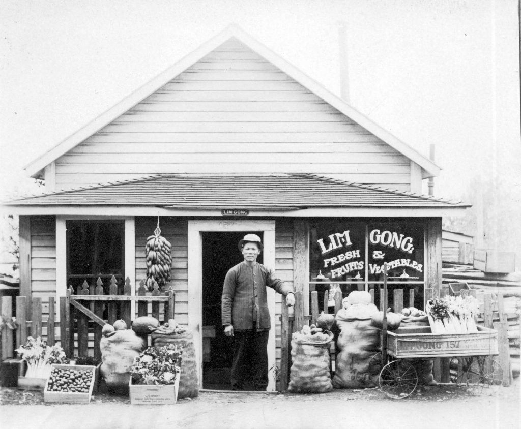 Lim Gong in front of his fruit and vegetable store at 151 2nd Street in North Vancouver in 1910. CVA Bu P670